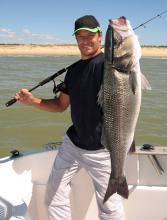 fisherman in Florida holding fish